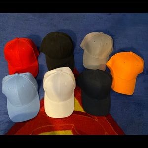 Lot of 7 baseball caps (plain)